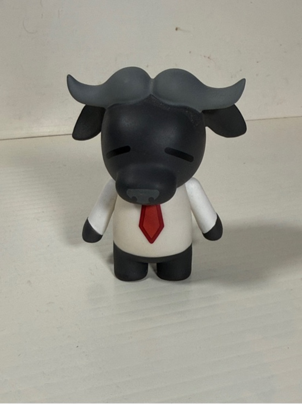 Kidrobot x Sanrio Aggretsuko Director Ton 3-inch vinyl figure